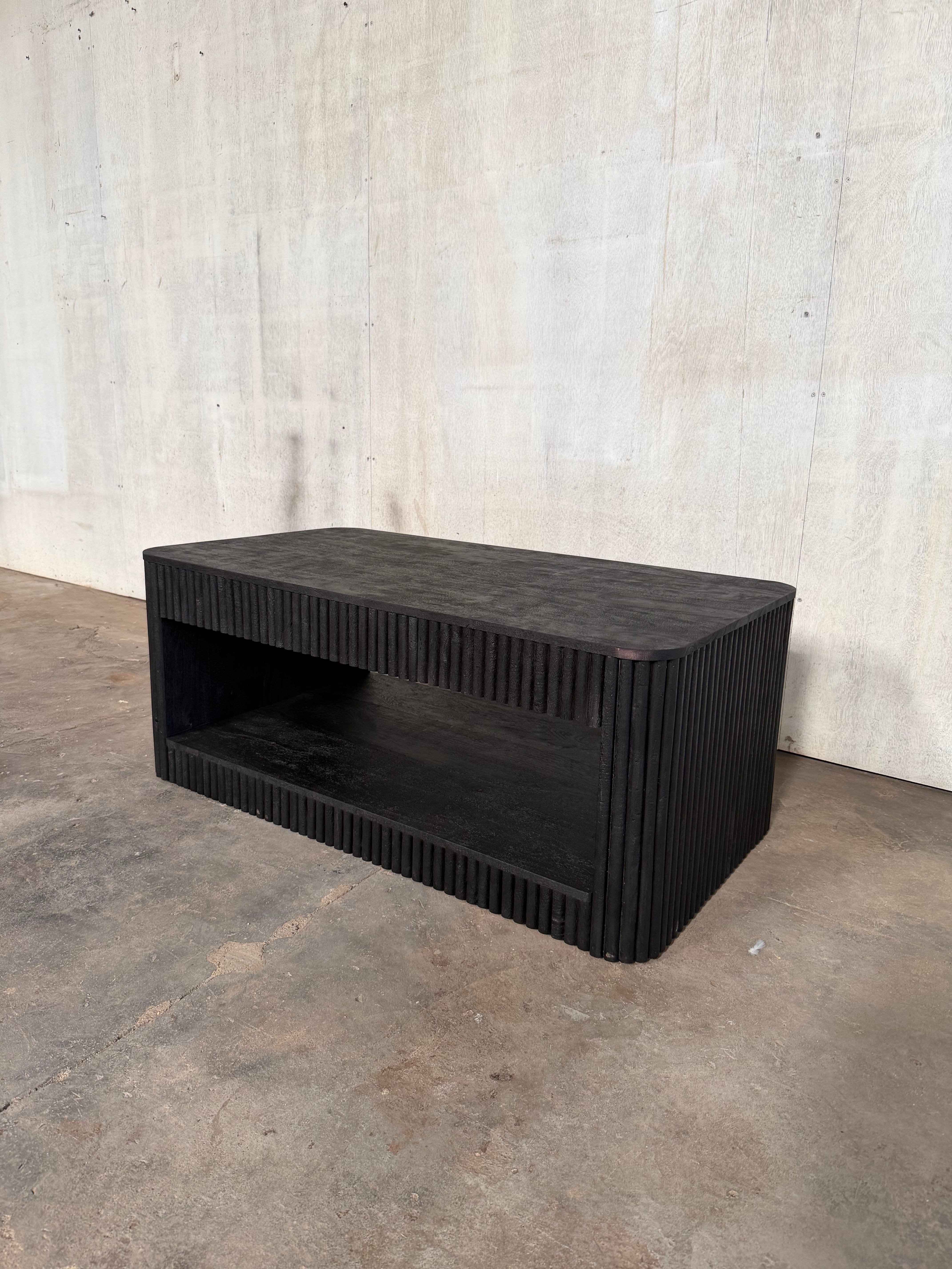 Stria Coffee Table — 43″ (Black Sand)