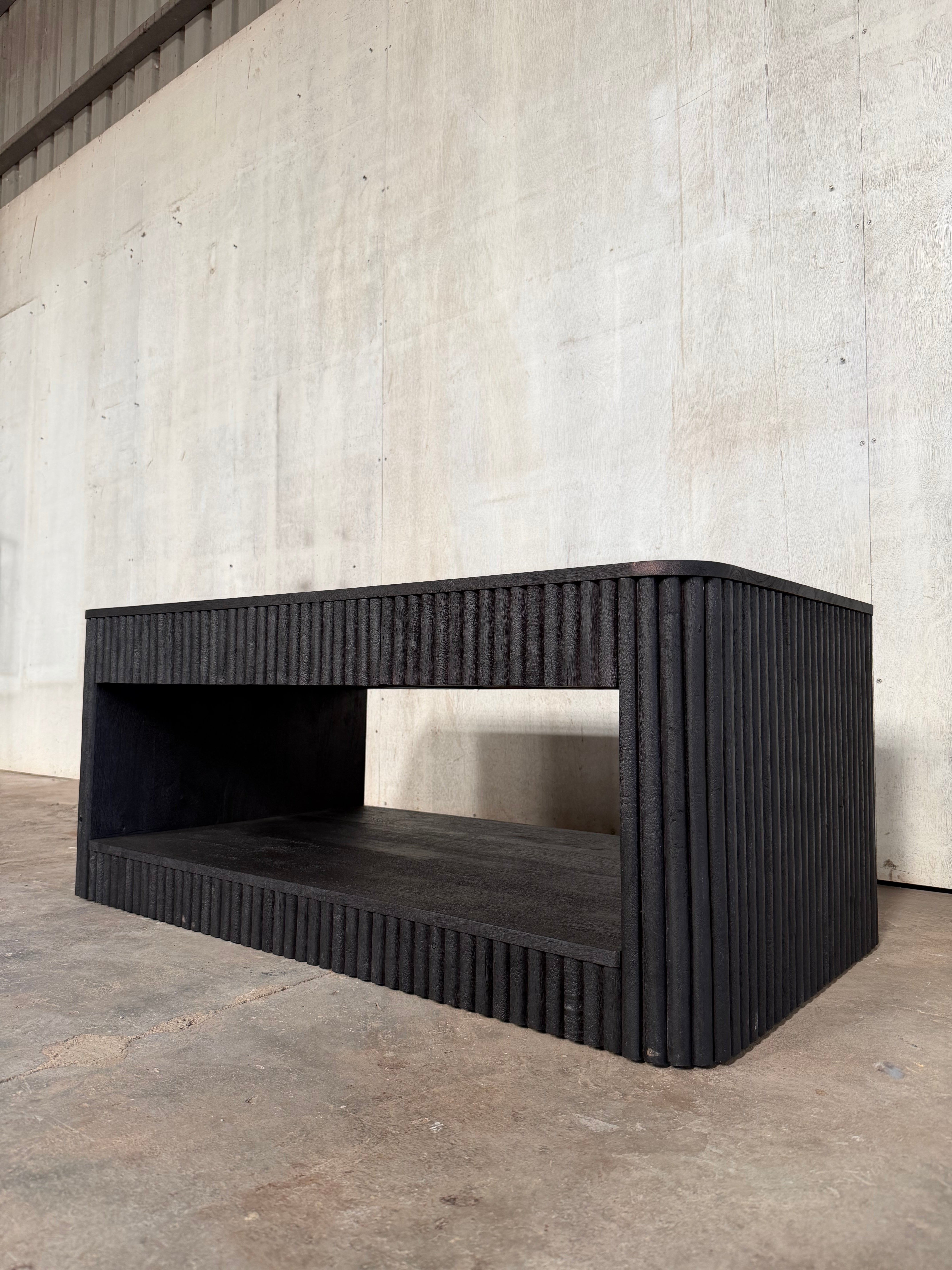 Stria Coffee Table — 43″ (Black Sand)