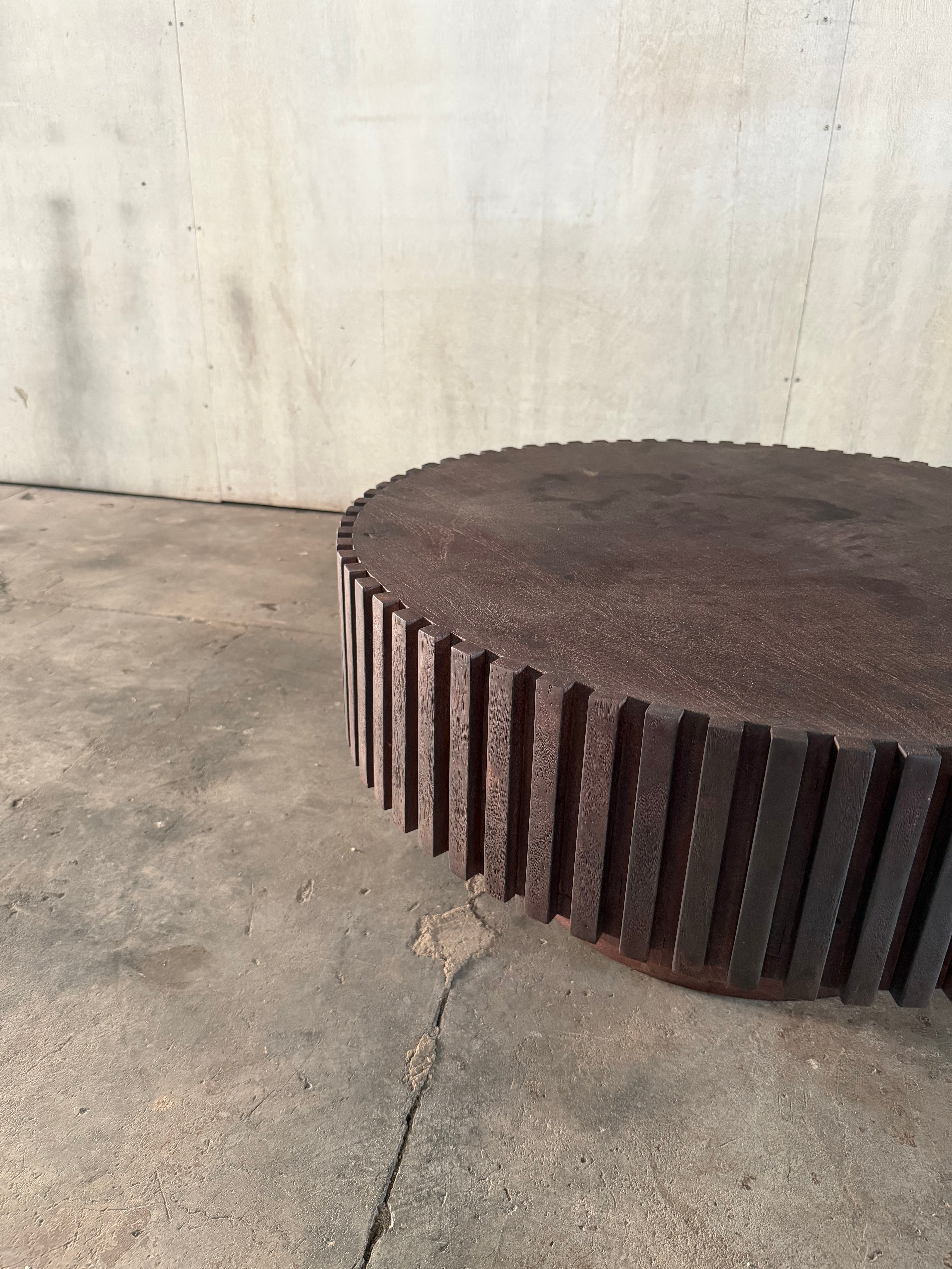 Acacia fluted round coffee table in black sand finish