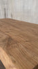 Short product video showing tabletop texture, live edge profile, and base design.